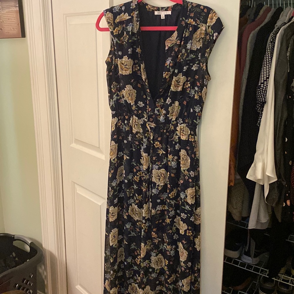 Long sleeveless summer dress with drawstring tie at waist